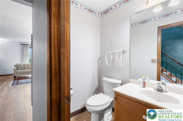 1411 Linden St, Bethlehem City, PA 18018 - half bath featuring wood finished floors and vanity