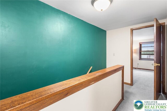 1411 Linden St, Bethlehem City, PA 18018 - hall featuring carpet floors and an upstairs landing