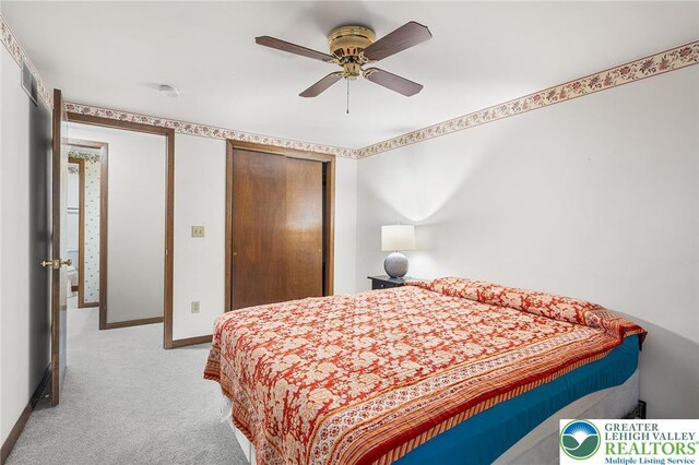 1411 Linden St, Bethlehem City, PA 18018 - bedroom with light colored carpet, a closet, and a ceiling fan