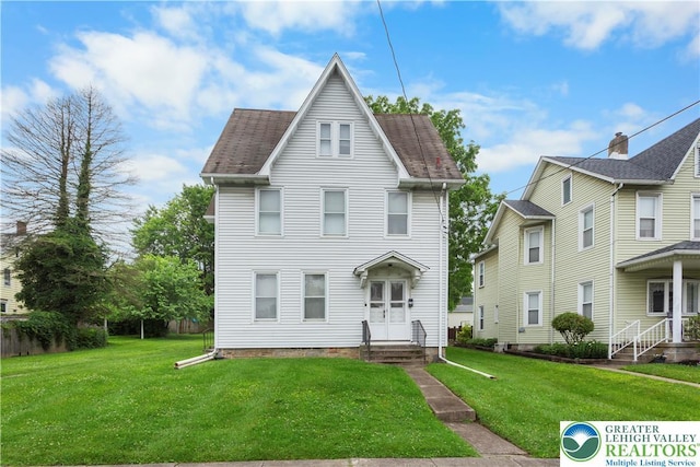 170 S Whitfield St, Nazareth Boro, PA 18064 - view of front of house featuring a front lawn