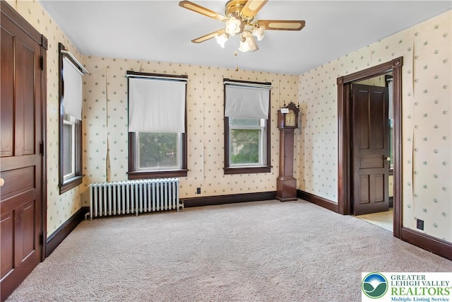 170 S Whitfield St, Nazareth Boro, PA 18064 - spare room with radiator, wallpapered walls, carpet, and ceiling fan