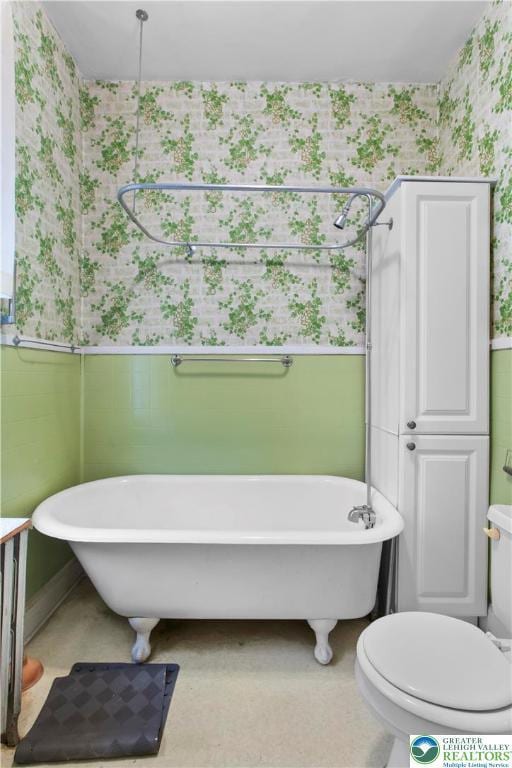 170 S Whitfield St, Nazareth Boro, PA 18064 - bathroom with wallpapered walls, wainscoting, and a soaking tub