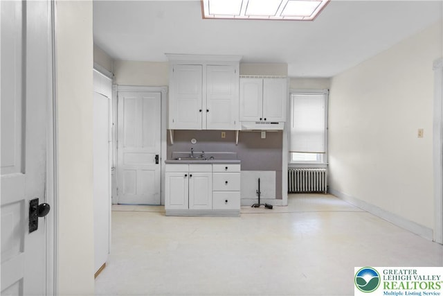 170 S Whitfield St, Nazareth Boro, PA 18064 - kitchen with radiator heating unit and white cabinets