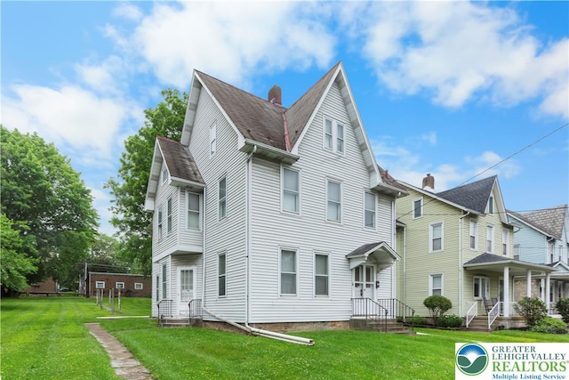 170 S Whitfield St, Nazareth Boro, PA 18064 - view of front of property with a front yard and a shingled roof