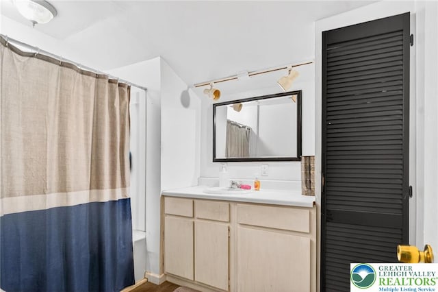 485 S Walnut St, Slatington Boro, PA 18080 - full bathroom with vanity, shower / bath combination with curtain, and wood finished floors
