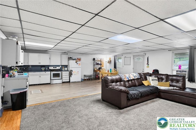 485 S Walnut St, Slatington Boro, PA 18080 - living room featuring light wood finished floors and a paneled ceiling