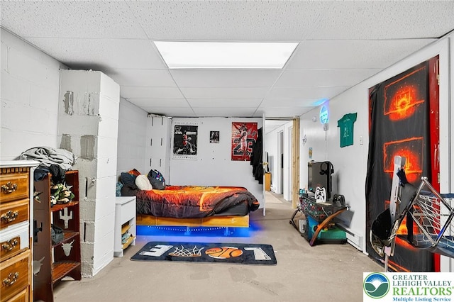 485 S Walnut St, Slatington Boro, PA 18080 - bedroom with a paneled ceiling, concrete floors, and concrete block wall