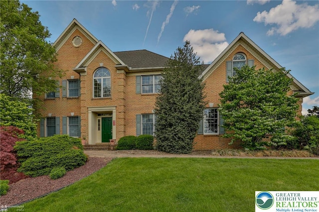 634 Country Club Rd, Easton, PA 18045 - colonial inspired home featuring brick siding and a front lawn