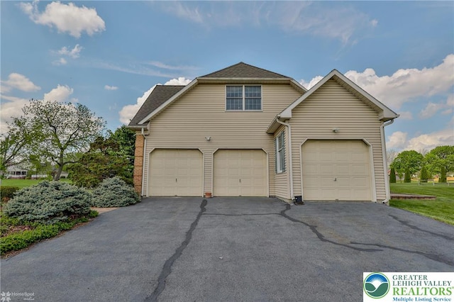 634 Country Club Rd, Easton, PA 18045 - traditional-style home with driveway and an attached garage