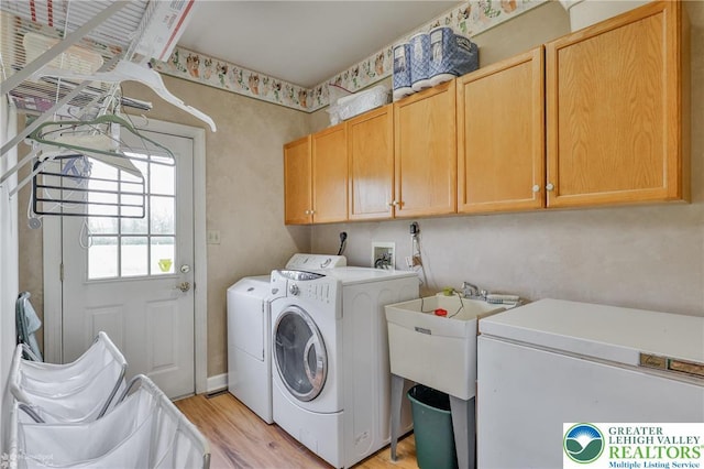 634 Country Club Rd, Easton, PA 18045 - laundry room featuring cabinet space, separate washer and dryer, and light wood-style floors