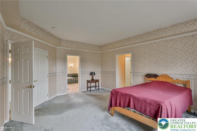 634 Country Club Rd, Easton, PA 18045 - bedroom featuring wallpapered walls, carpet flooring, wainscoting, and ensuite bath