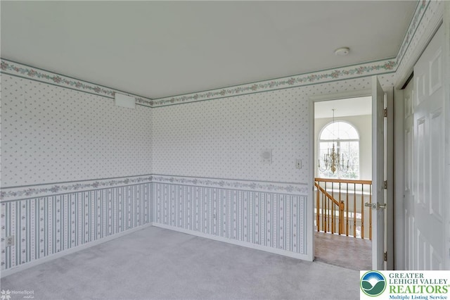 634 Country Club Rd, Easton, PA 18045 - carpeted spare room with wallpapered walls and a smoke detector