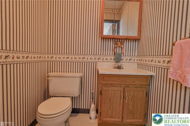 634 Country Club Rd, Easton, PA 18045 - half bath featuring wallpapered walls and vanity