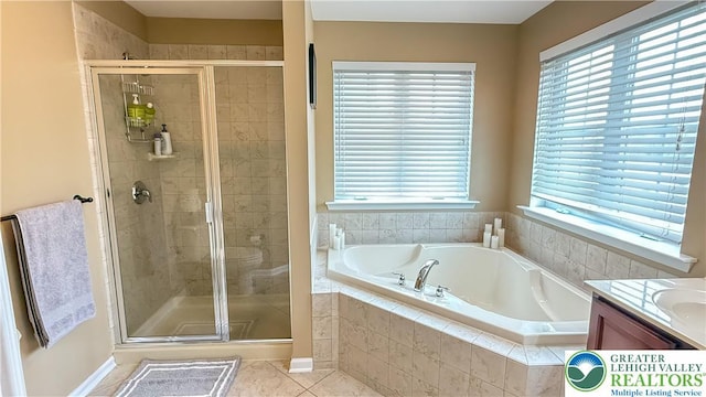 102 Gray Dr, Allen Twp, PA 18067 - full bath featuring a garden tub, tile patterned flooring, a stall shower, and vanity