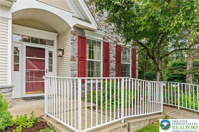 1883 Gregory Pl, Lower Saucon Twp, PA 18055 - entrance to property with stone siding and covered porch