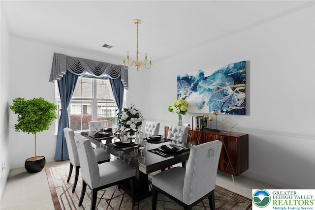 1883 Gregory Pl, Lower Saucon Twp, PA 18055 - dining room with a chandelier, carpet flooring, and crown molding