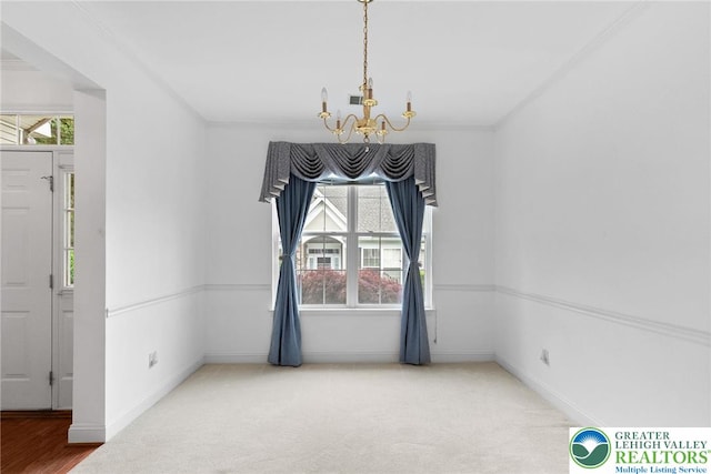 1883 Gregory Pl, Lower Saucon Twp, PA 18055 - carpeted spare room with a chandelier and ornamental molding