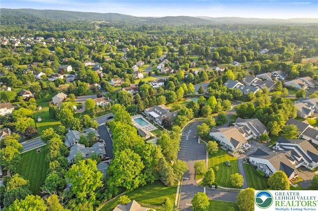1883 Gregory Pl, Lower Saucon Twp, PA 18055 - aerial perspective of suburban area with a heavily wooded area