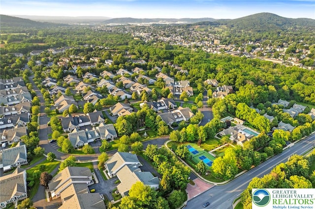 1883 Gregory Pl, Lower Saucon Twp, PA 18055 - aerial perspective of suburban area featuring a mountain backdrop