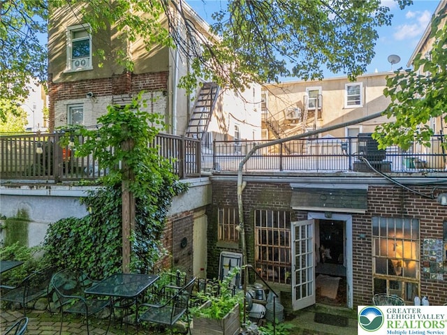 209 Northampton St, Easton, PA 18042 - rear view of house featuring brick siding