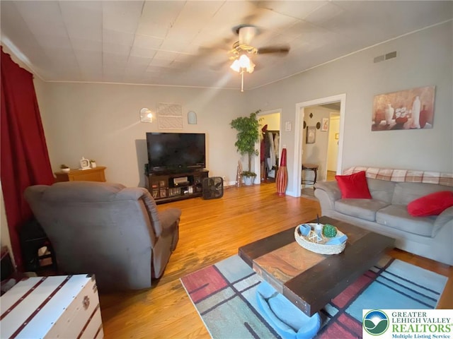 209 Northampton St, Easton, PA 18042 - living area with wood finished floors and ceiling fan