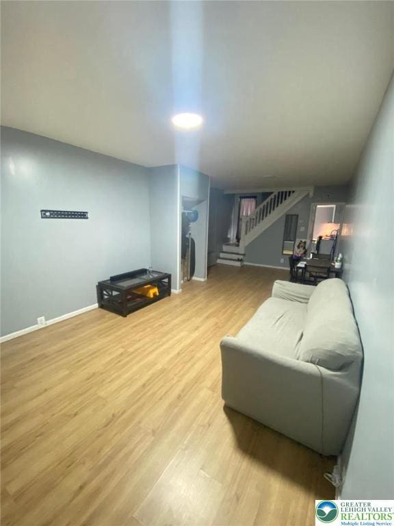 522 N Jordan St, Allentown City, PA 18102 - living room with stairs and light wood-style flooring