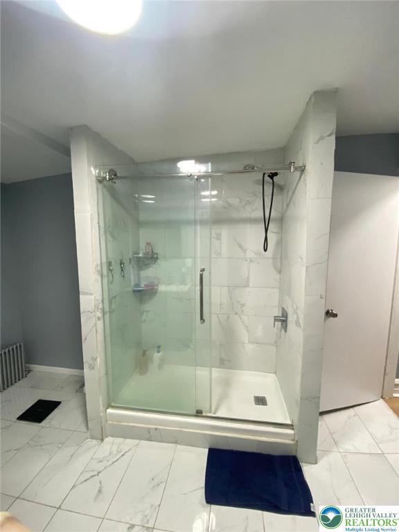 522 N Jordan St, Allentown City, PA 18102 - full bath with a stall shower and marble look tiles
