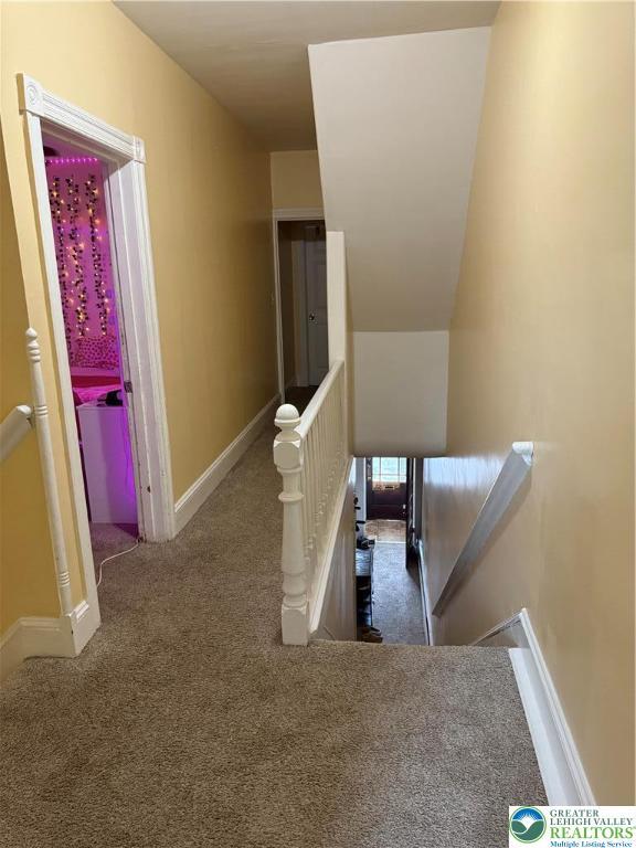 713 E 5th St, Bethlehem City, PA 18015 - stairway featuring carpet floors and baseboards