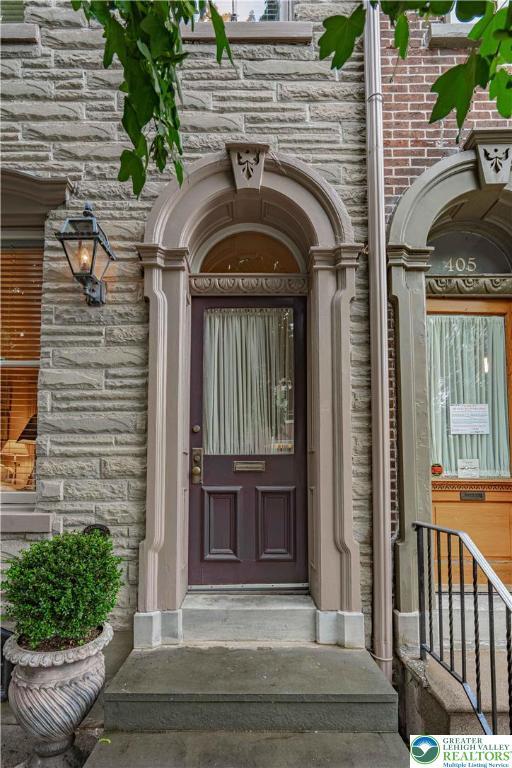407 N 8th St, Allentown City, PA 18102 - view of exterior entry with stone siding