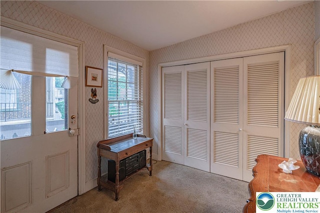 407 N 8th St, Allentown City, PA 18102 - doorway to outside with wallpapered walls and carpet flooring