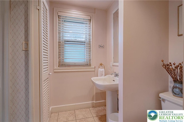 407 N 8th St, Allentown City, PA 18102 - bathroom featuring toilet and tile patterned flooring