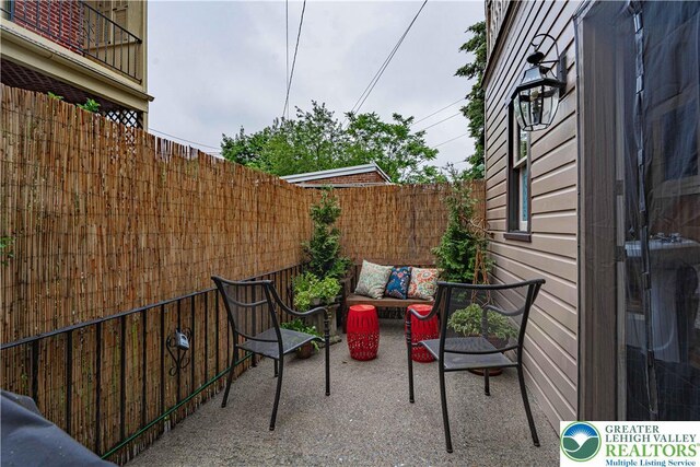407 N 8th St, Allentown City, PA 18102 - fenced backyard with a patio and outdoor lounge area