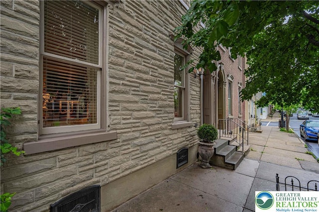 407 N 8th St, Allentown City, PA 18102 - view of home's exterior featuring stone siding