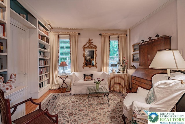 407 N 8th St, Allentown City, PA 18102 - sitting room featuring plenty of natural light, wood finished floors, and ornamental molding