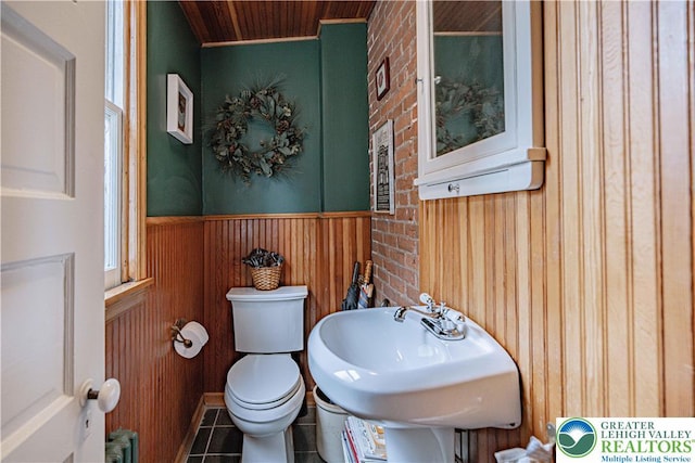 407 N 8th St, Allentown City, PA 18102 - bathroom featuring wood walls, a wainscoted wall, tile patterned floors, wood ceiling, and radiator