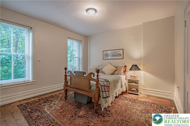 407 N 8th St, Allentown City, PA 18102 - bedroom with hardwood / wood-style flooring and baseboards