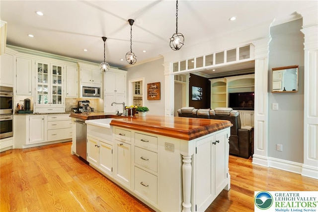 2051 Forge Run, Bethlehem City, PA 18015 - kitchen featuring appliances with stainless steel finishes, butcher block countertops, ornate columns, recessed lighting, and light wood finished floors