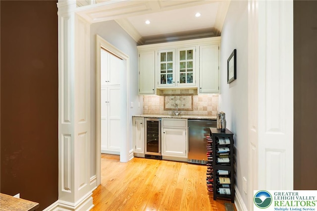 2051 Forge Run, Bethlehem City, PA 18015 - indoor bar featuring wine cooler, crown molding, tasteful backsplash, light wood-style flooring, and recessed lighting