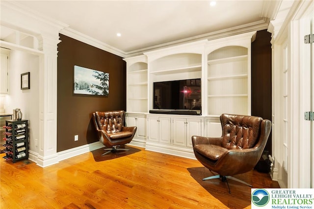 2051 Forge Run, Bethlehem City, PA 18015 - sitting room featuring ornamental molding, light wood finished floors, recessed lighting, and built in shelves
