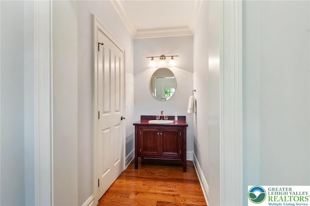2051 Forge Run, Bethlehem City, PA 18015 - bathroom featuring vanity, ornamental molding, and wood finished floors