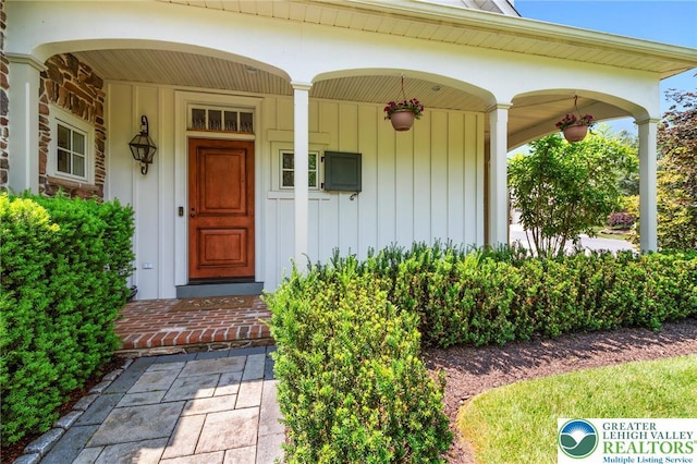 2051 Forge Run, Bethlehem City, PA 18015 - property entrance featuring covered porch and board and batten siding