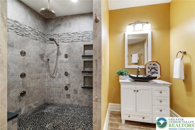 2051 Forge Run, Bethlehem City, PA 18015 - full bath with a tile shower, vanity, and wood finished floors