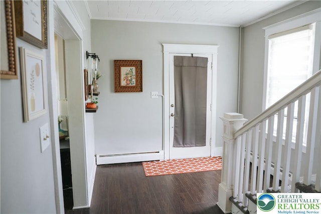5242 3rd St, Whitehall Twp, PA 18052 - entrance foyer featuring dark wood-style floors, a baseboard radiator, and crown molding