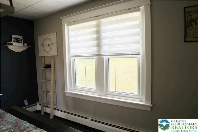 5242 3rd St, Whitehall Twp, PA 18052 - detailed view of baseboard heating and a drop ceiling