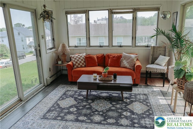 5242 3rd St, Whitehall Twp, PA 18052 - sunroom / solarium featuring a baseboard heating unit, wood finished floors, and healthy amount of natural light