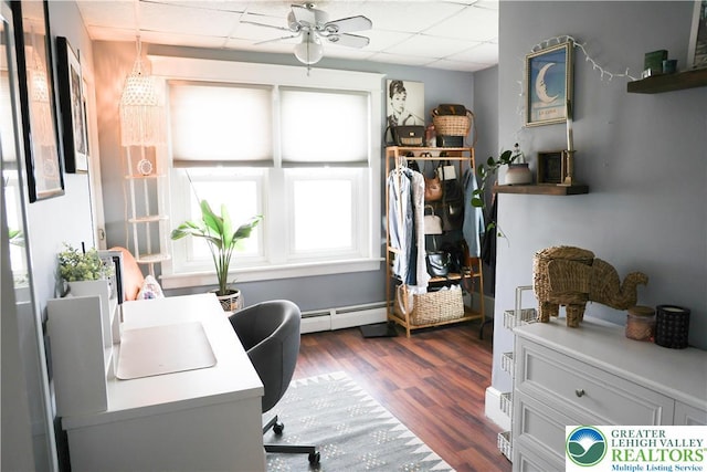 5242 3rd St, Whitehall Twp, PA 18052 - office with ceiling fan, a baseboard heating unit, a paneled ceiling, and dark wood-type flooring