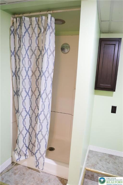5242 3rd St, Whitehall Twp, PA 18052 - bathroom with a shower with curtain and baseboards