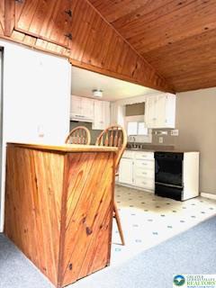 3641 Sequoia Dr, Middle Smithfield Twp, PA 18302 - kitchen with wooden ceiling, white cabinetry, and light carpet