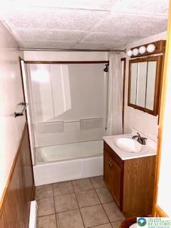 3641 Sequoia Dr, Middle Smithfield Twp, PA 18302 - bathroom featuring vanity,  shower combination, tile patterned floors, and a baseboard heating unit