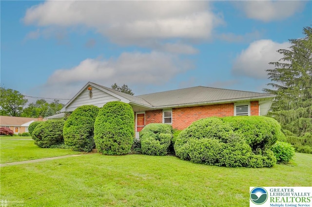 3609 Erie St, Palmer Twp, PA 18045 - view of front of house with a front lawn and brick siding